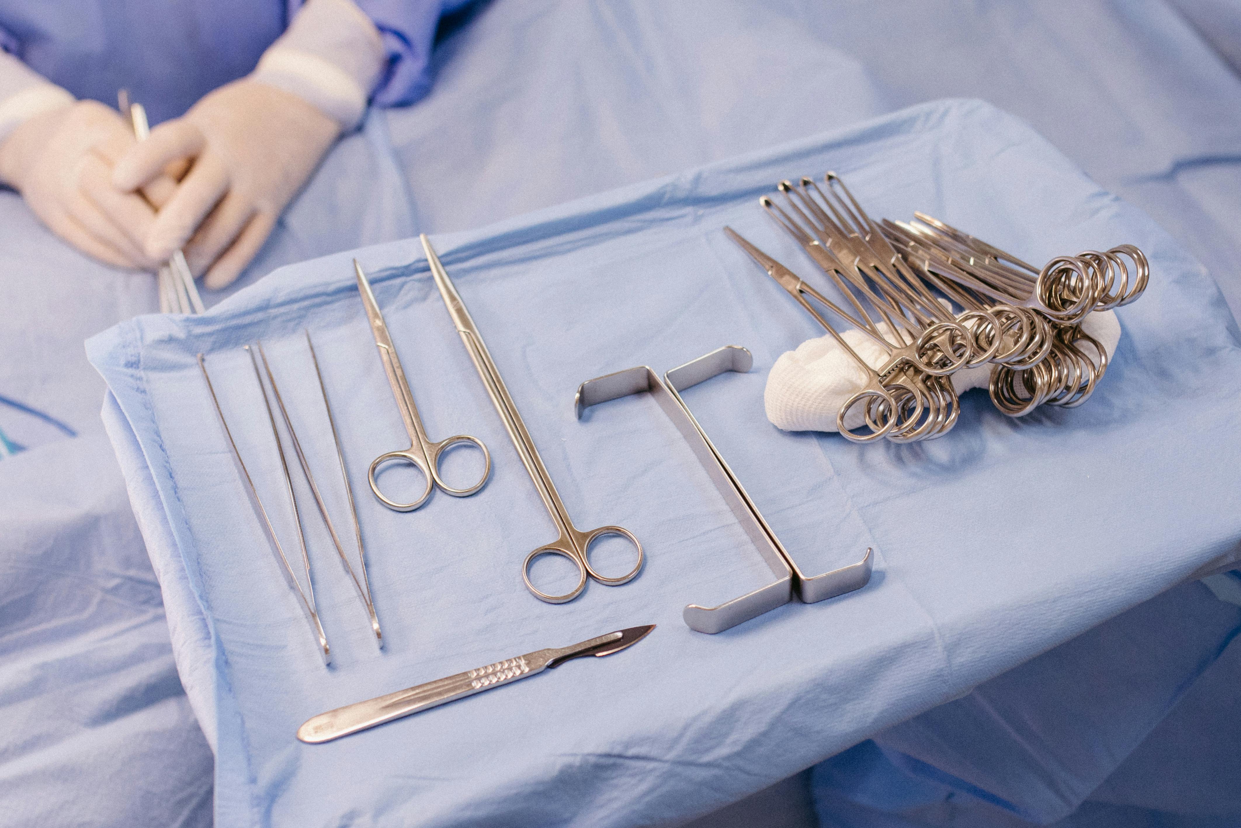 Nurse scanning an instrument set with Curf Health